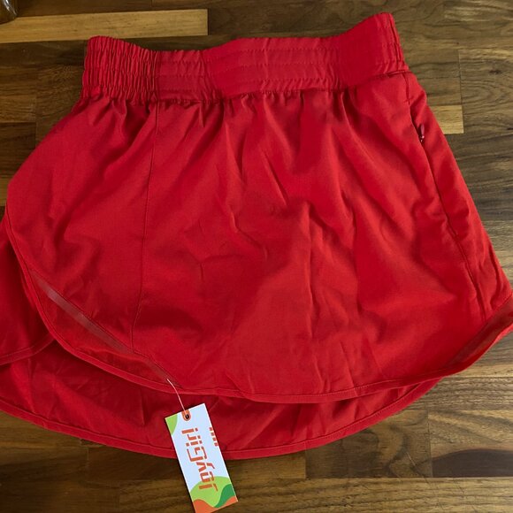 NWT JOYGIRL TENNIS SKORT WITH POCKET AND FRONT AND BACK ACCENTS RED SMALL - Picture 1 of 6